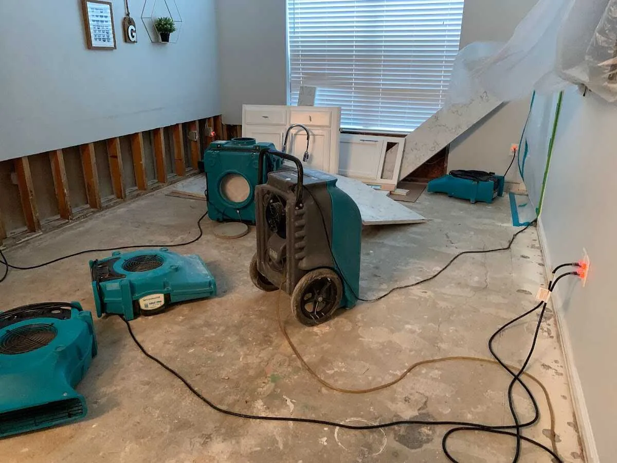 Dehumidifier in flood-cut room for Water Damage Restoration in Woodstock